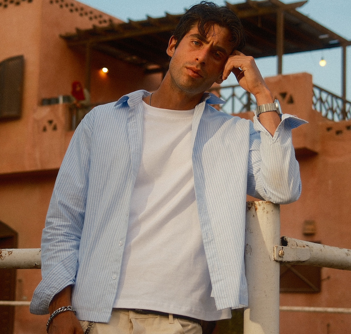 baby blue shirt.