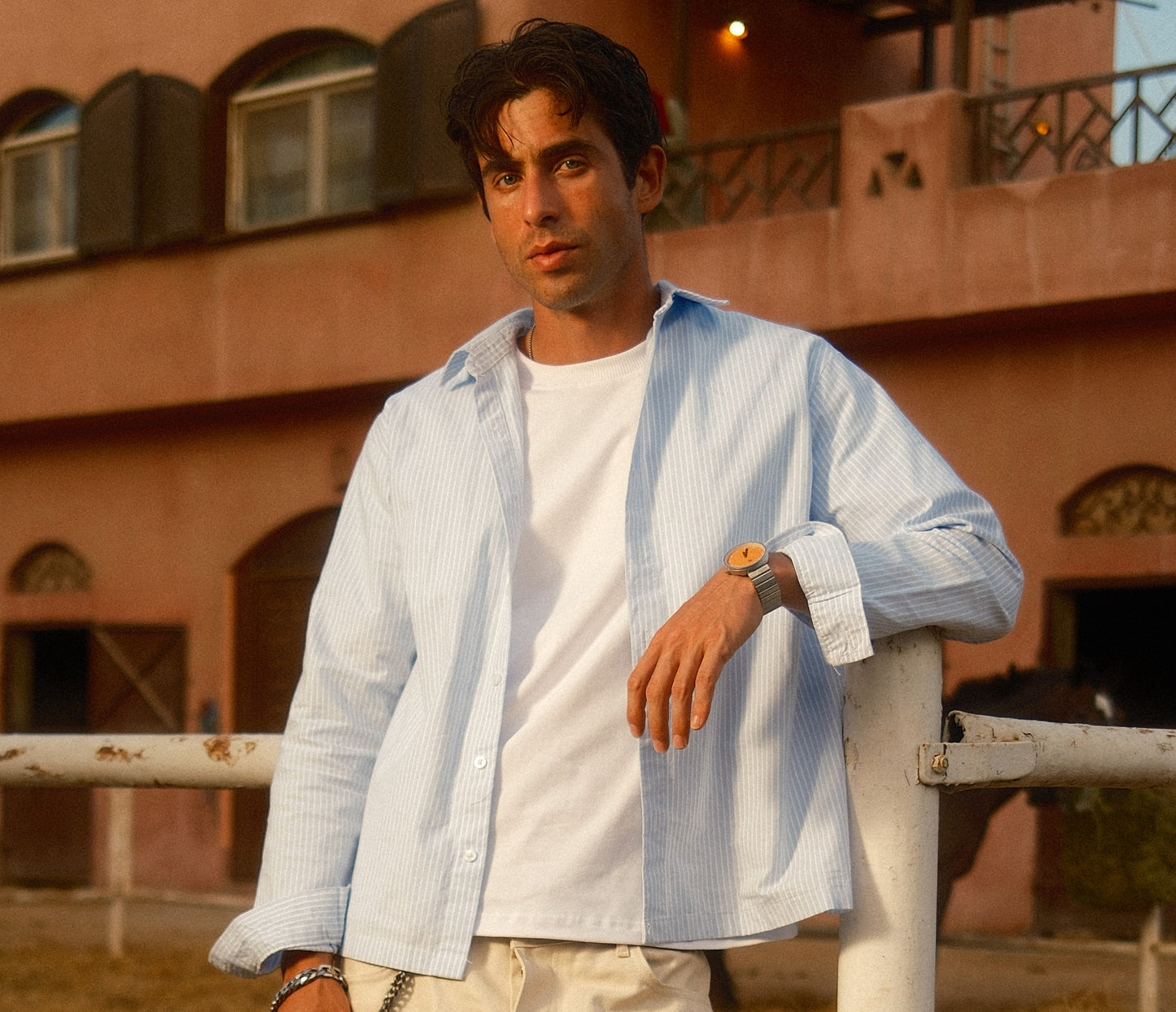 baby blue shirt.
